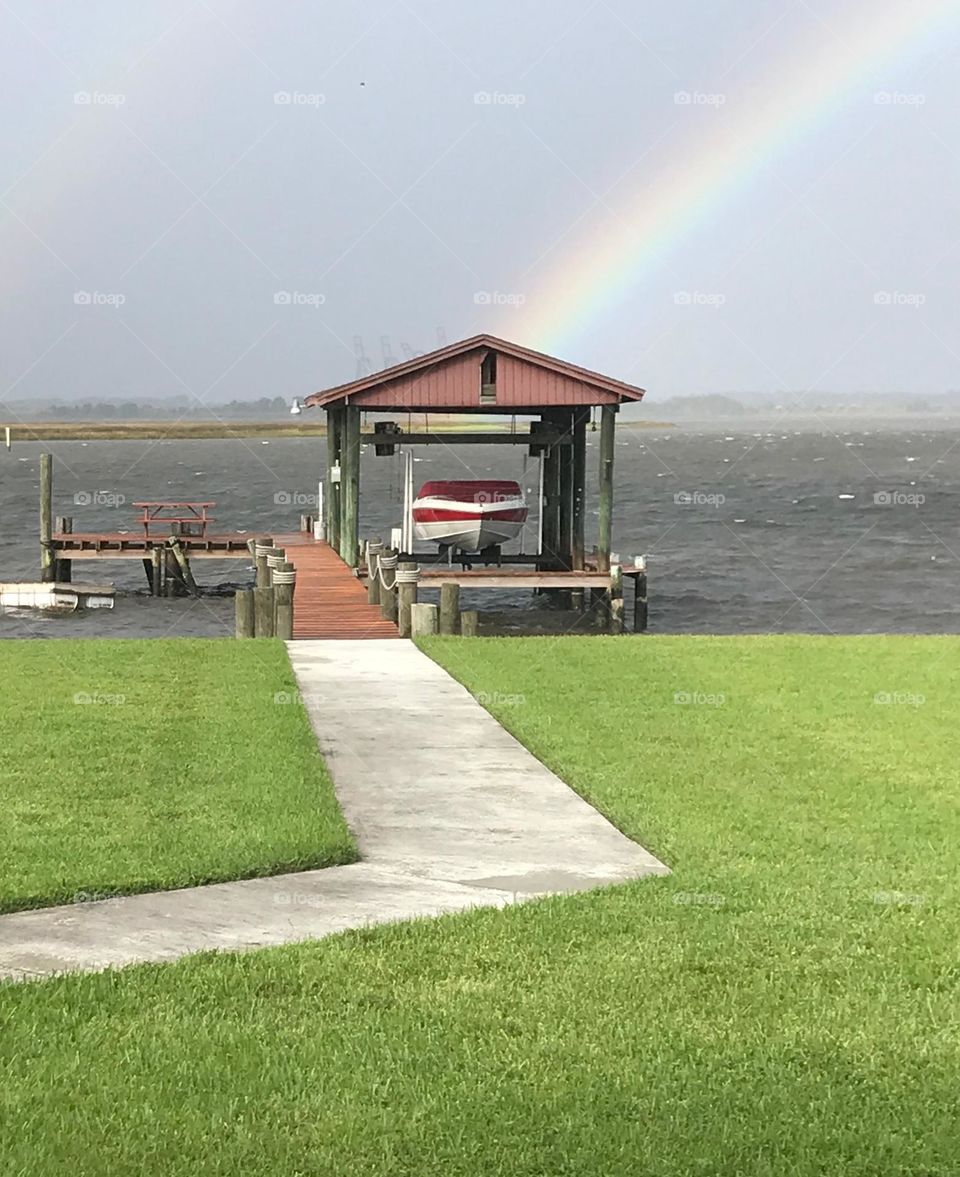 Rainbow over the river at the boathouse