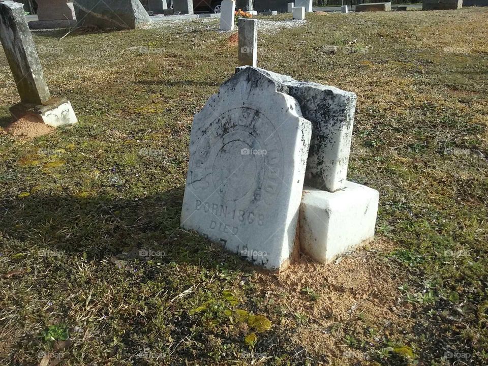 broken tombstone