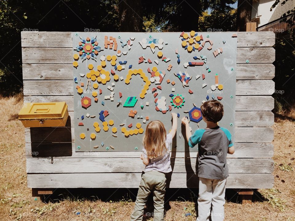 It's a puzzle. Playing with shapes to make pictures 