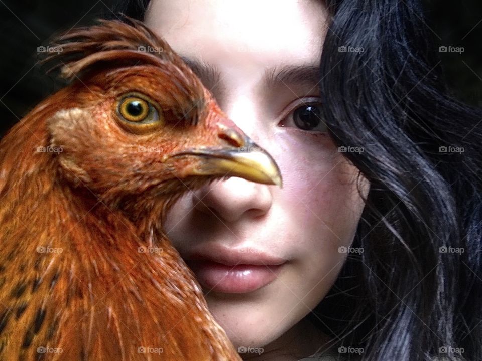 Faces, girl and chicken. Beautiful 