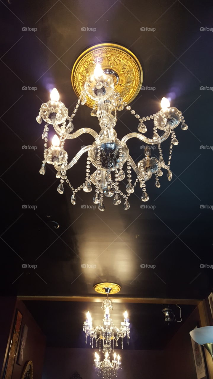 Chandeliers hanging from the ceiling