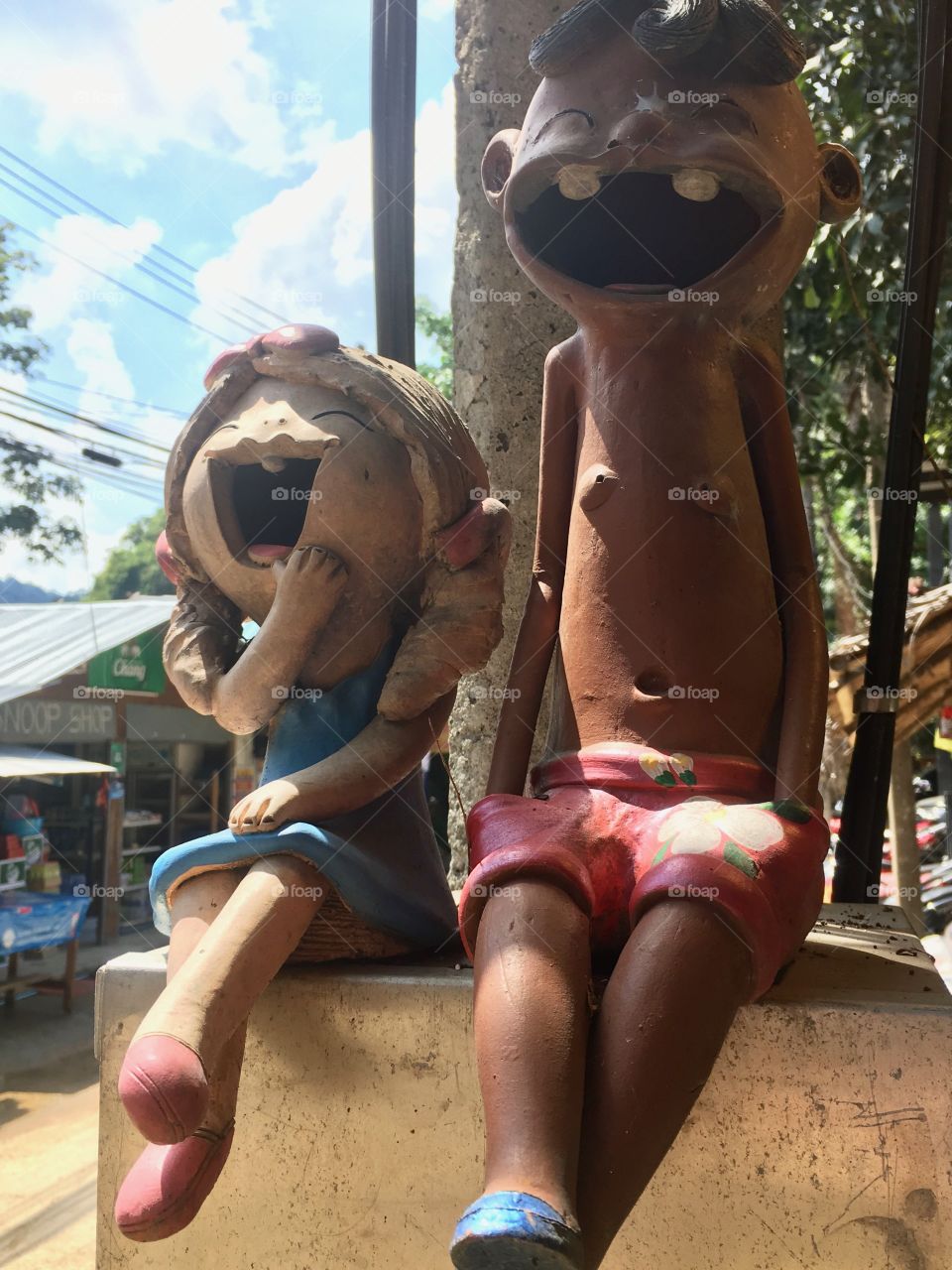 Happy , silly and funny clay figurines in Thailand. 