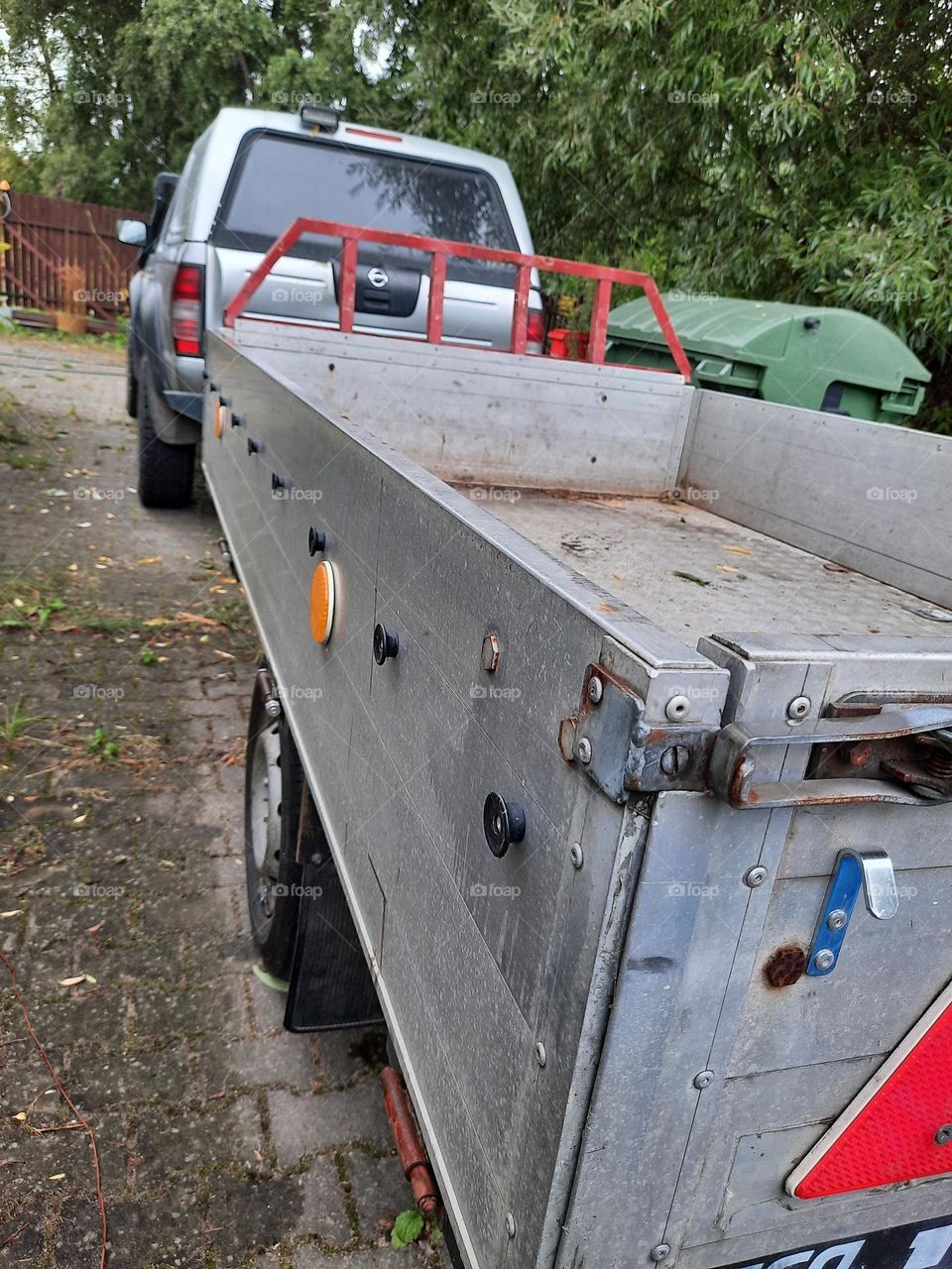 hard working car with a trailer