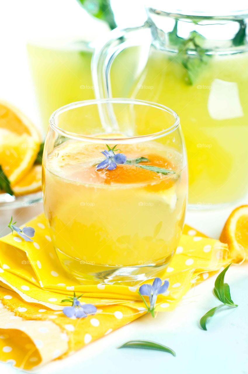Lemon juice in glass on table