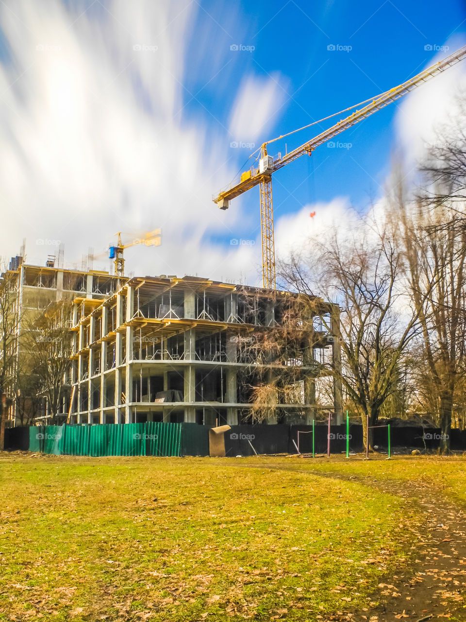 building process with crane on long exposure