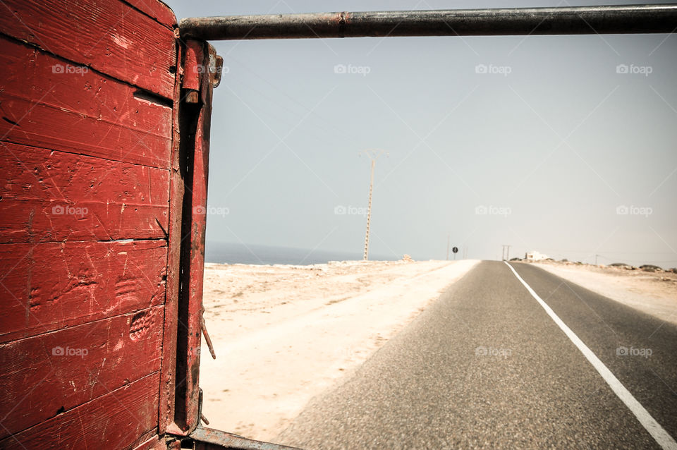 Traveling in the back of a truck