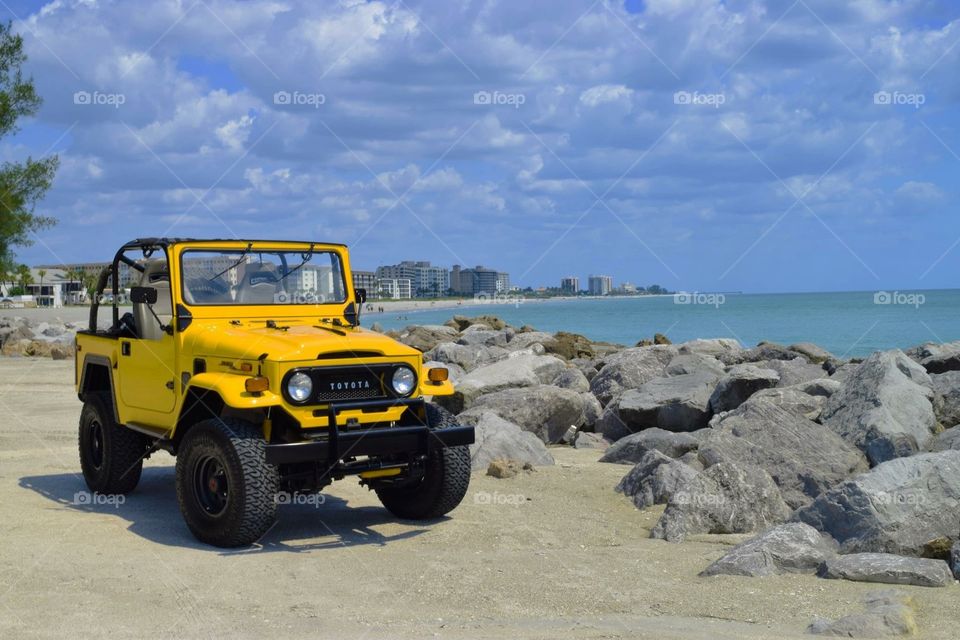 1970 Toyota Lancruiser FJ at the South Jettys at Venice Beach in Venice, FL.