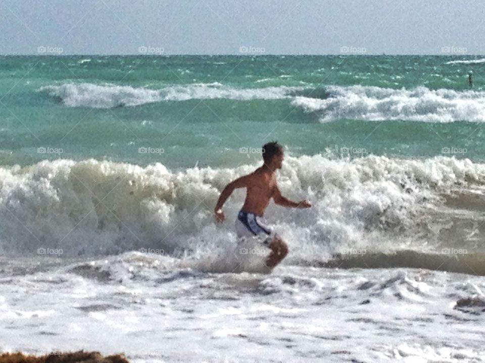 Run on the waves. A funny run on the waves