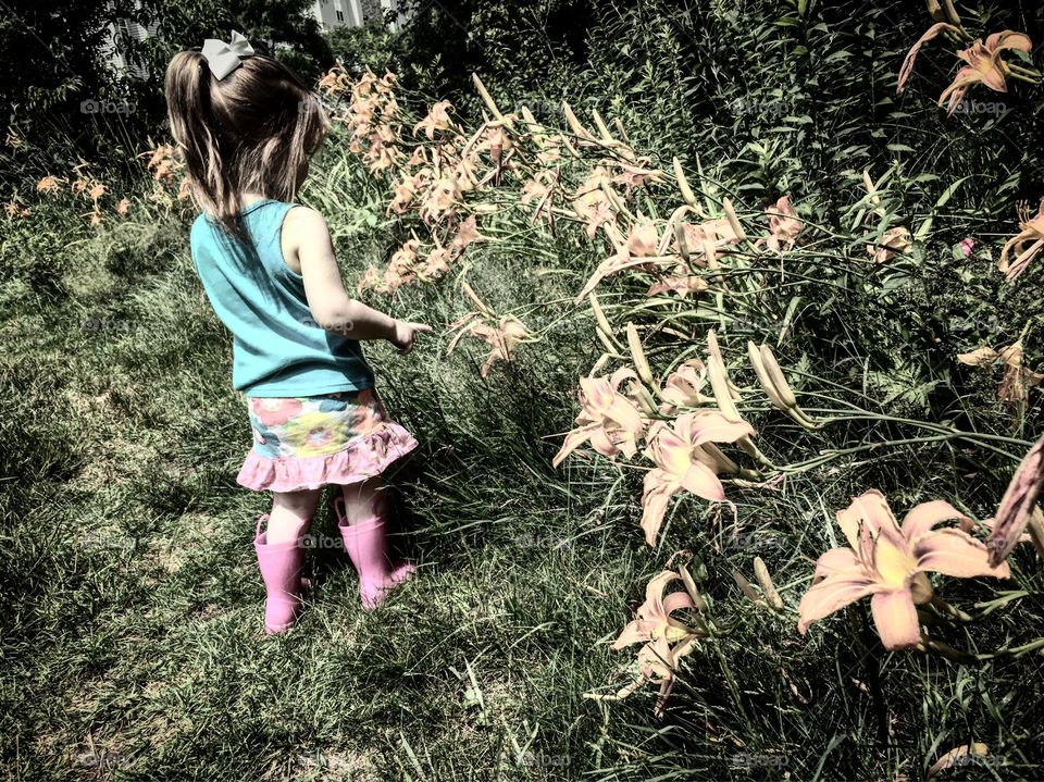 Little girl in the garden