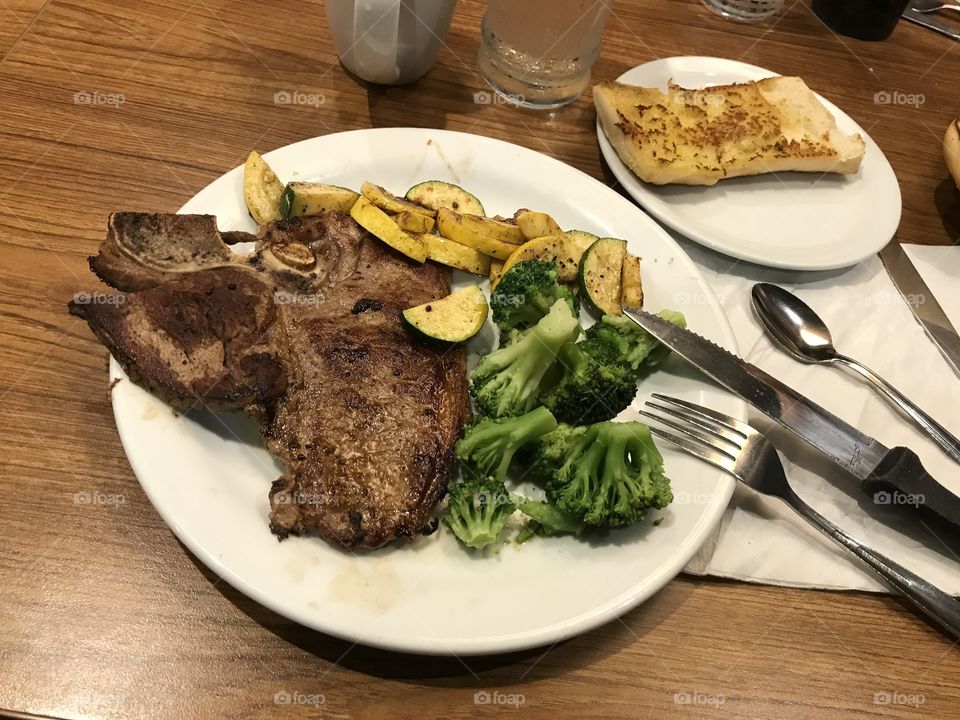 T-bone steak dinner. This meal looks and tastes good. So good that it was quite fulfilling.