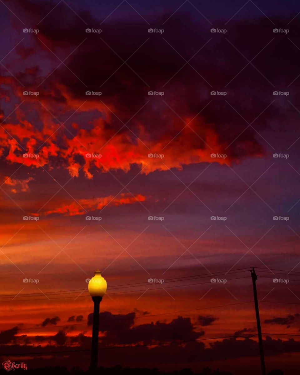 red sunset with lamp