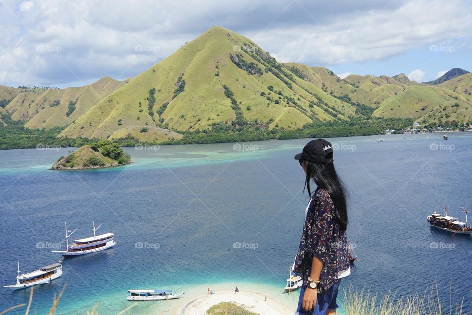 This is Kelor Island, one of iconic spot in Labuan Bajo East Indonesia, it's hard to climb a hill, but it works with the view fom the summit