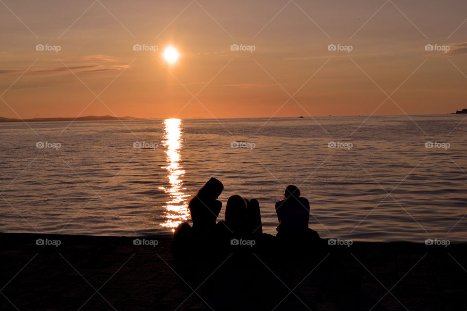 Friends watching the sunset