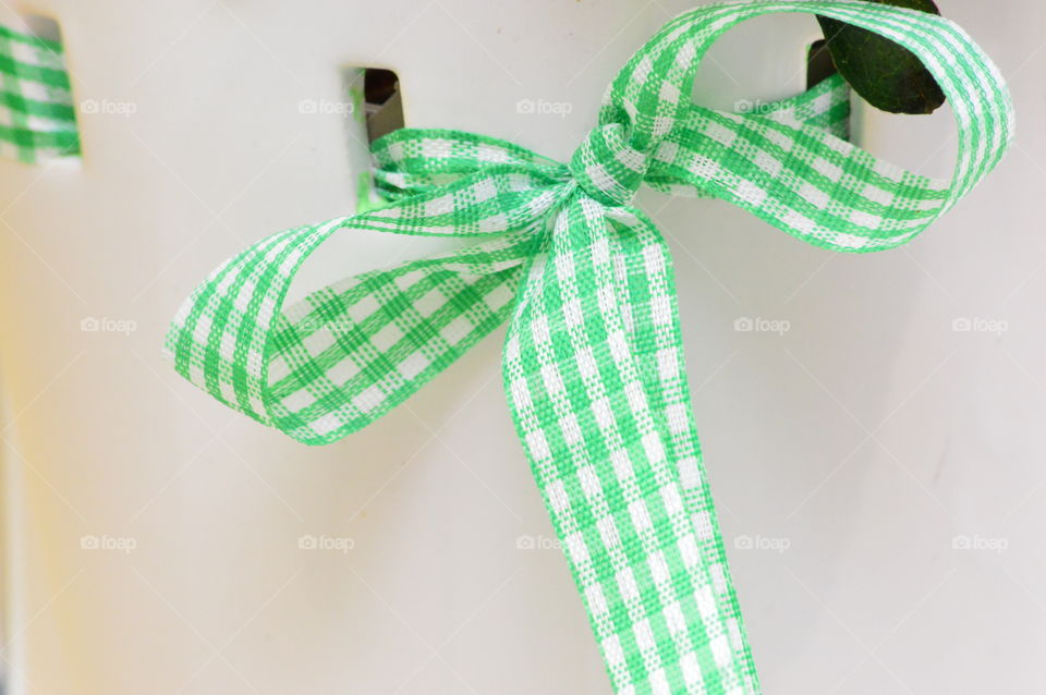 Close-up of tied green ribbon