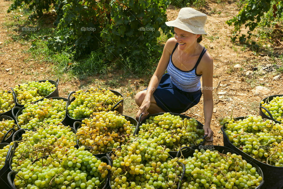 Girl rejoices in a big harvest