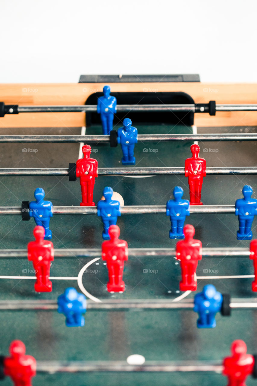 Table football game sport competition two competitors players on field. Closeup of players