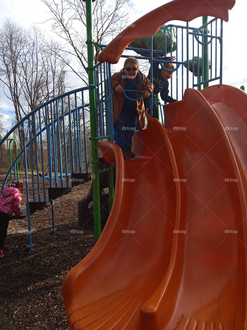 playground two boys and a girl