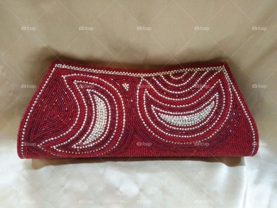 beautifulp red velvet purse for a party occassion.