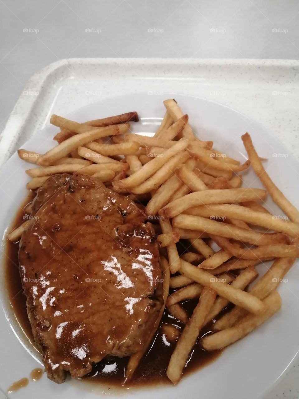 Fried potatoes and meat