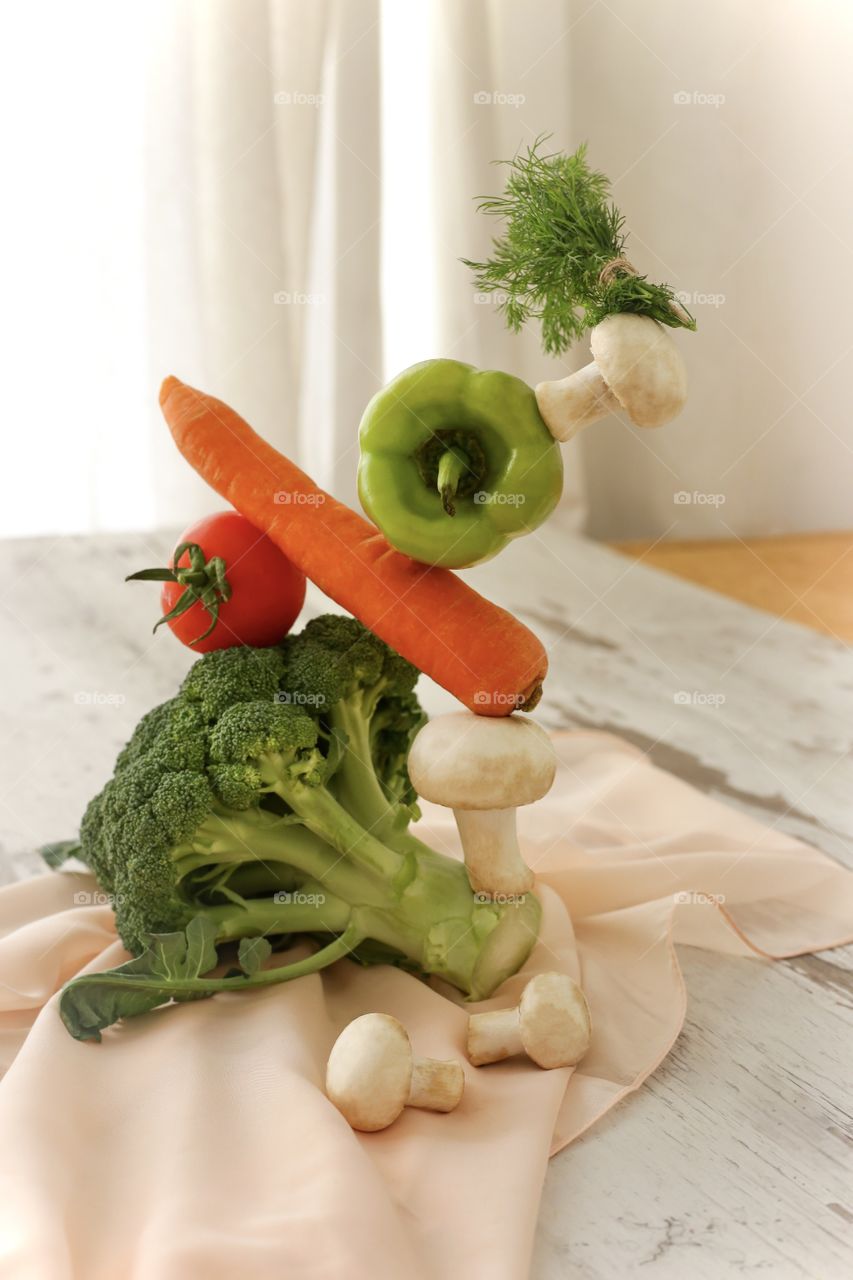 vegetable balance of broccoli, carrots and mushrooms