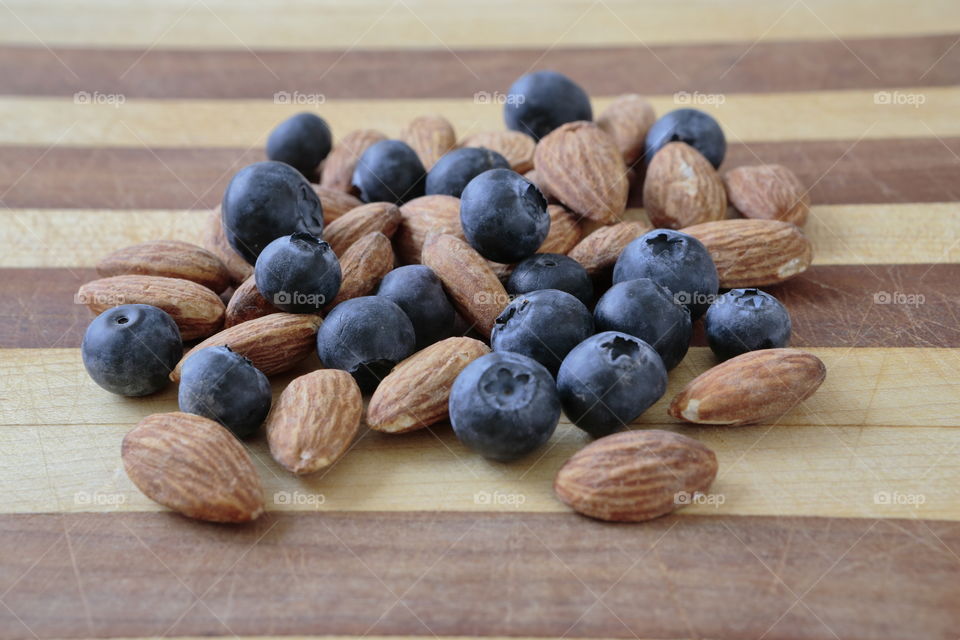 Almonds and blueberries for healthy snack. 