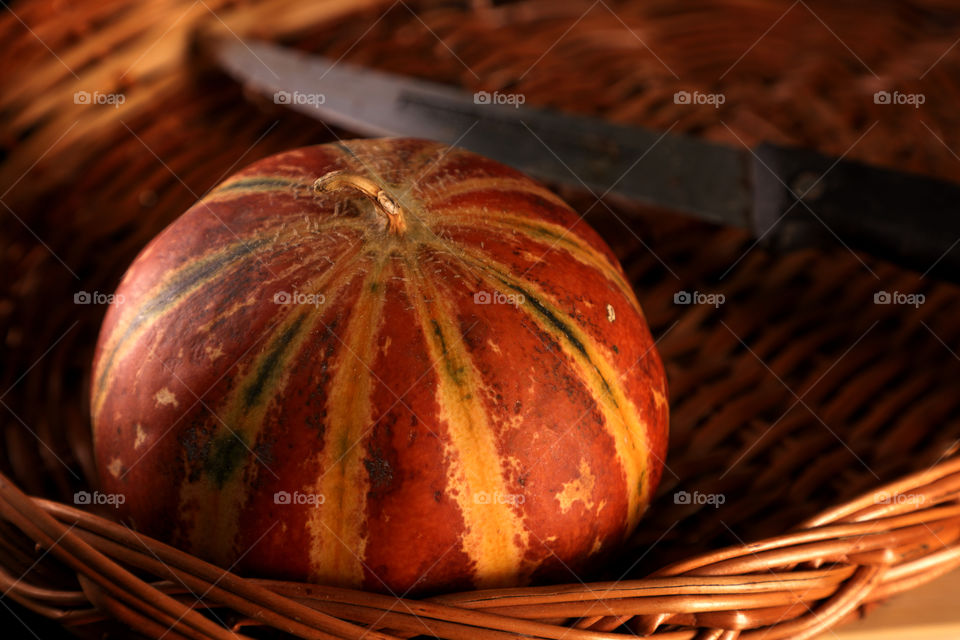 Summer cooler Indian Musk melon fruit in a cane basket