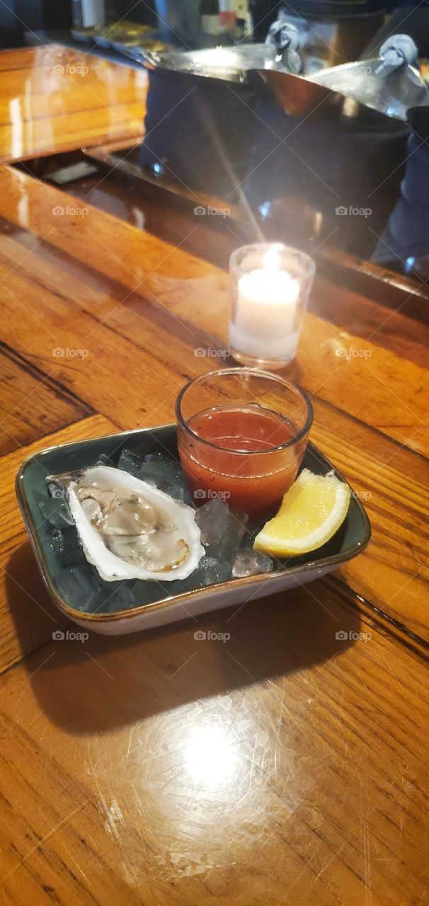 oyster shooter with lemon