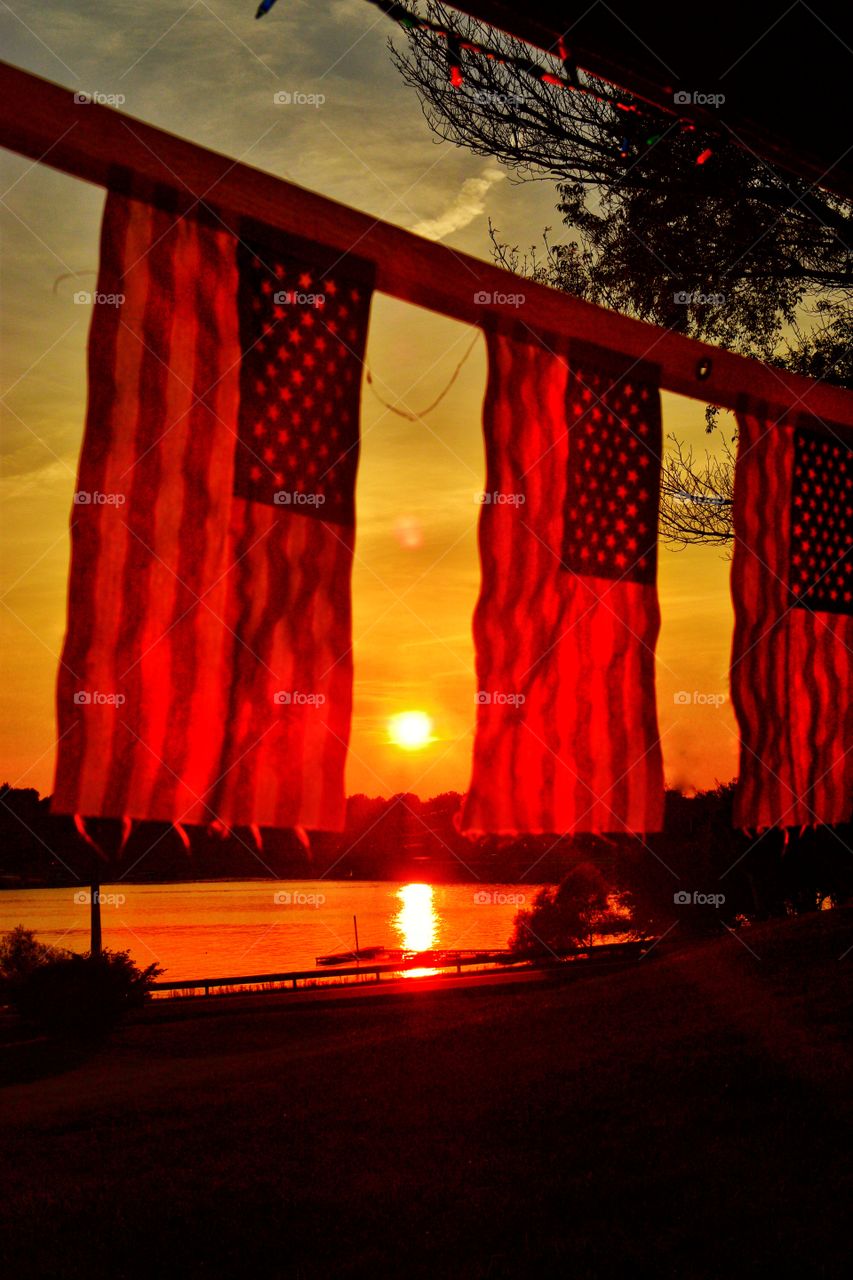 Sunset on the lake and American flags Indiana 