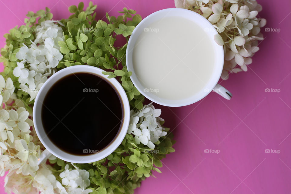 Coffee with milk and flowers 
