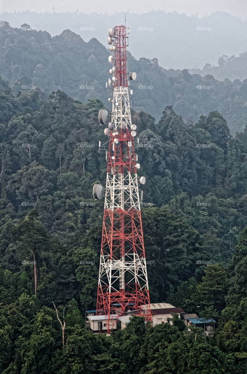Remote hilltop telecommunications tower