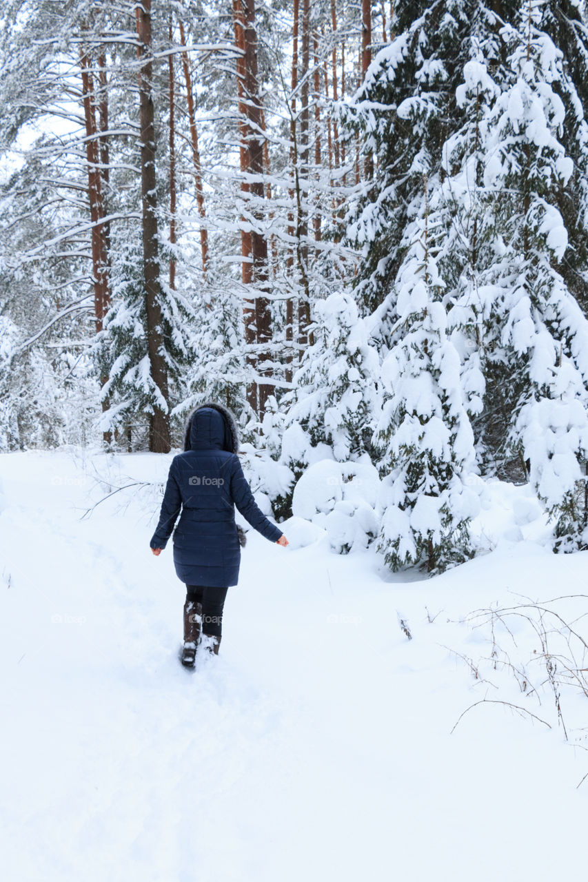 girl in winter forest