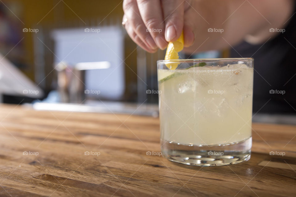 Person preparing drink