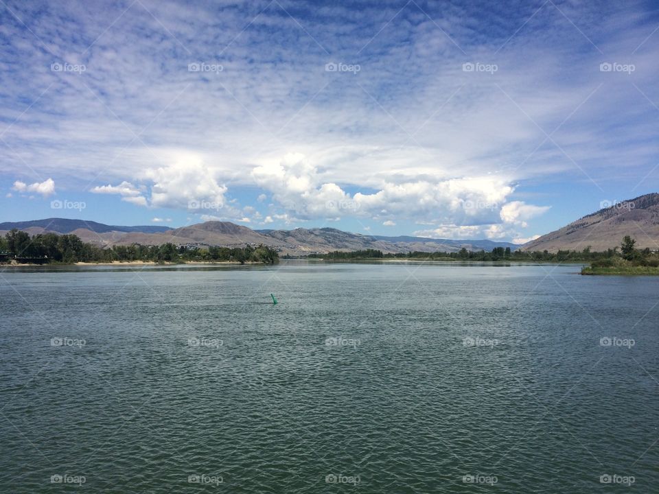 View of city river from park 