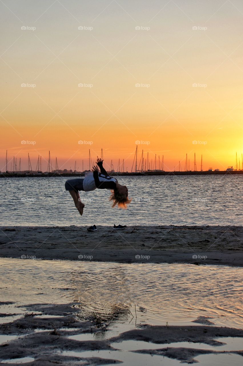 Jump in sunset 