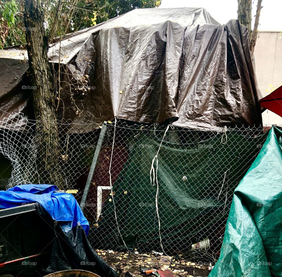 The homeless camp I live near in preparation for the coming rain storm; in Oakland California.