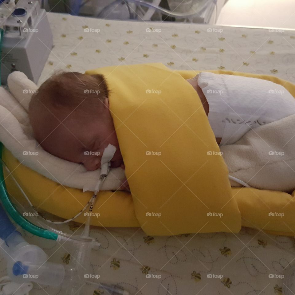 Our micro-preemie Michael taking a well deserved nap.
