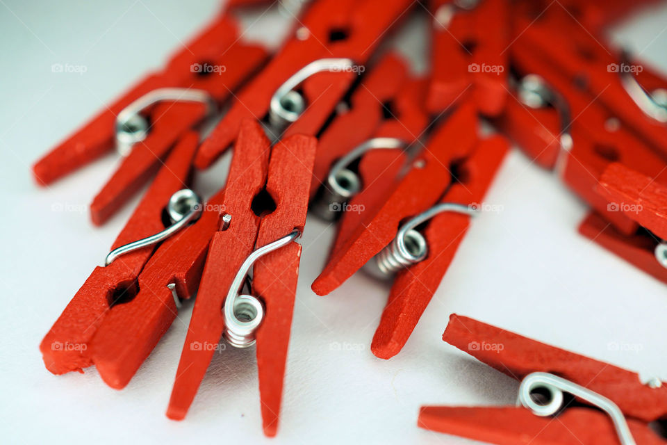 Directly above view of red cloth pegs