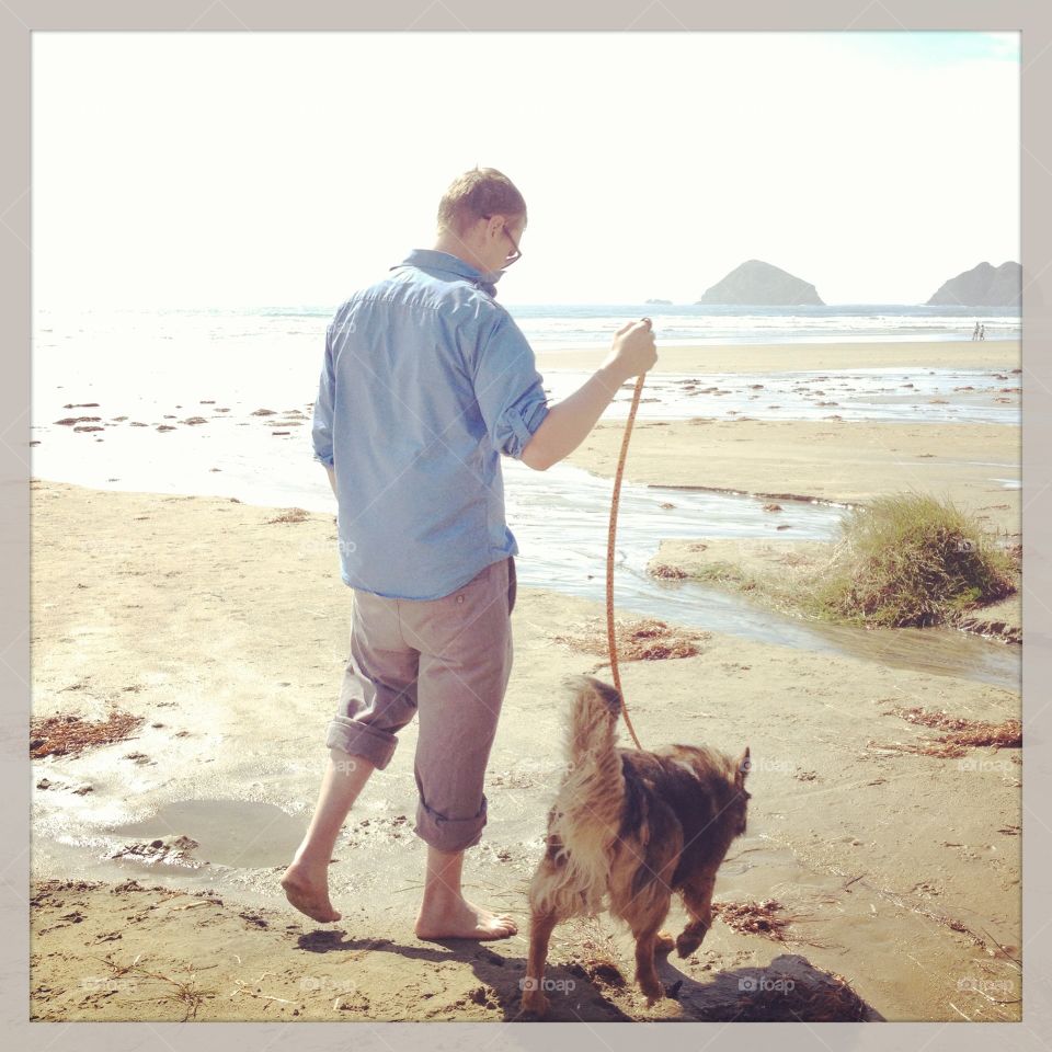 Ohana Means Family. Ryan's walking Ohana on the Oregon coast.