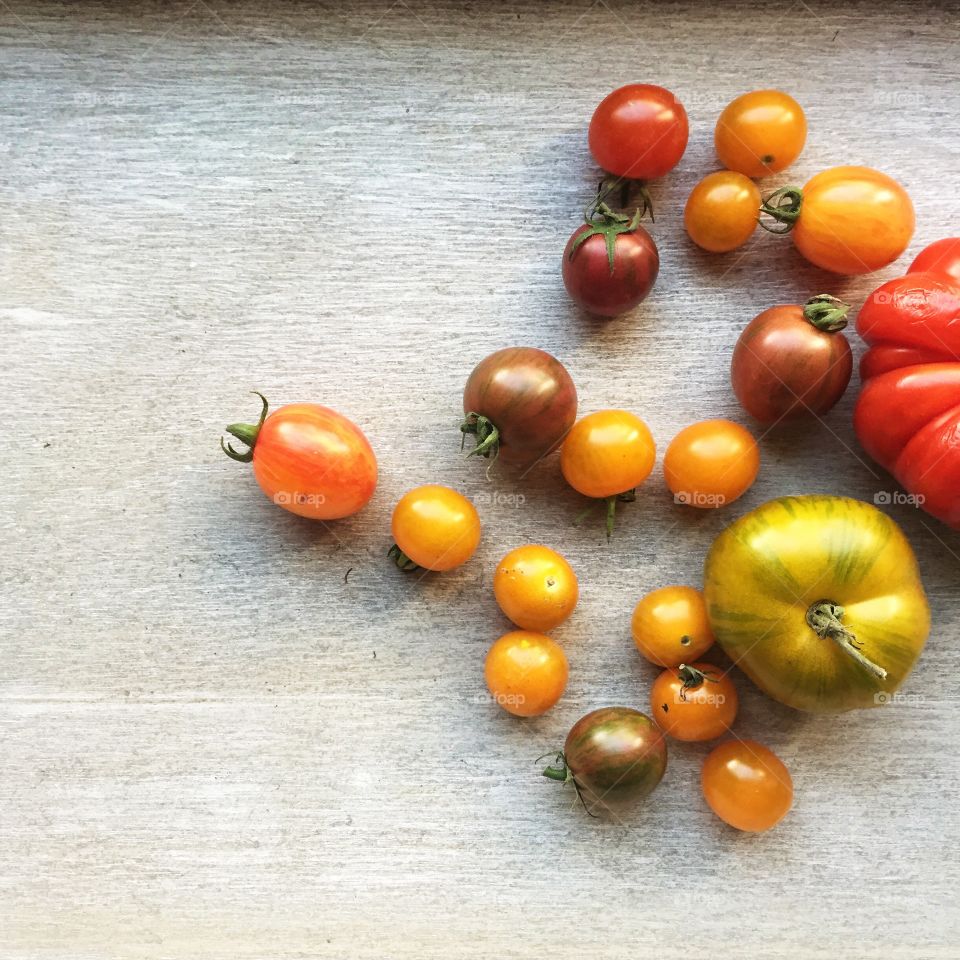 Variety of multi color organic heirloom tomatoes