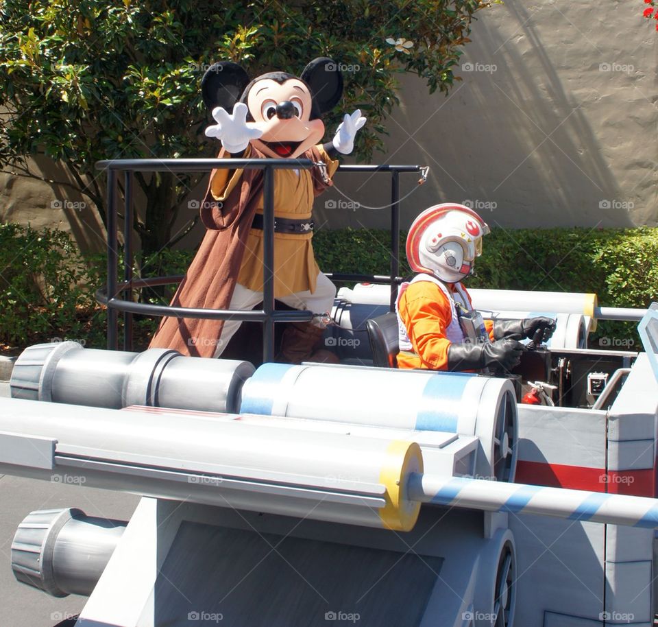 Jedi Mickey riding in an X-Wing Starfighter