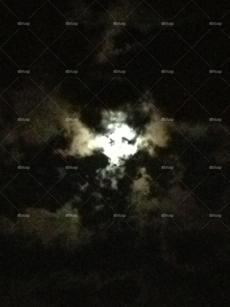 Moon through the clouds. 