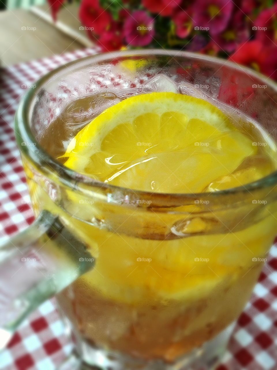 Fast refreshment lemon iced tea.. A single pleasure, no frills just chills. Hanging out on the patio and chilling with my friend.
