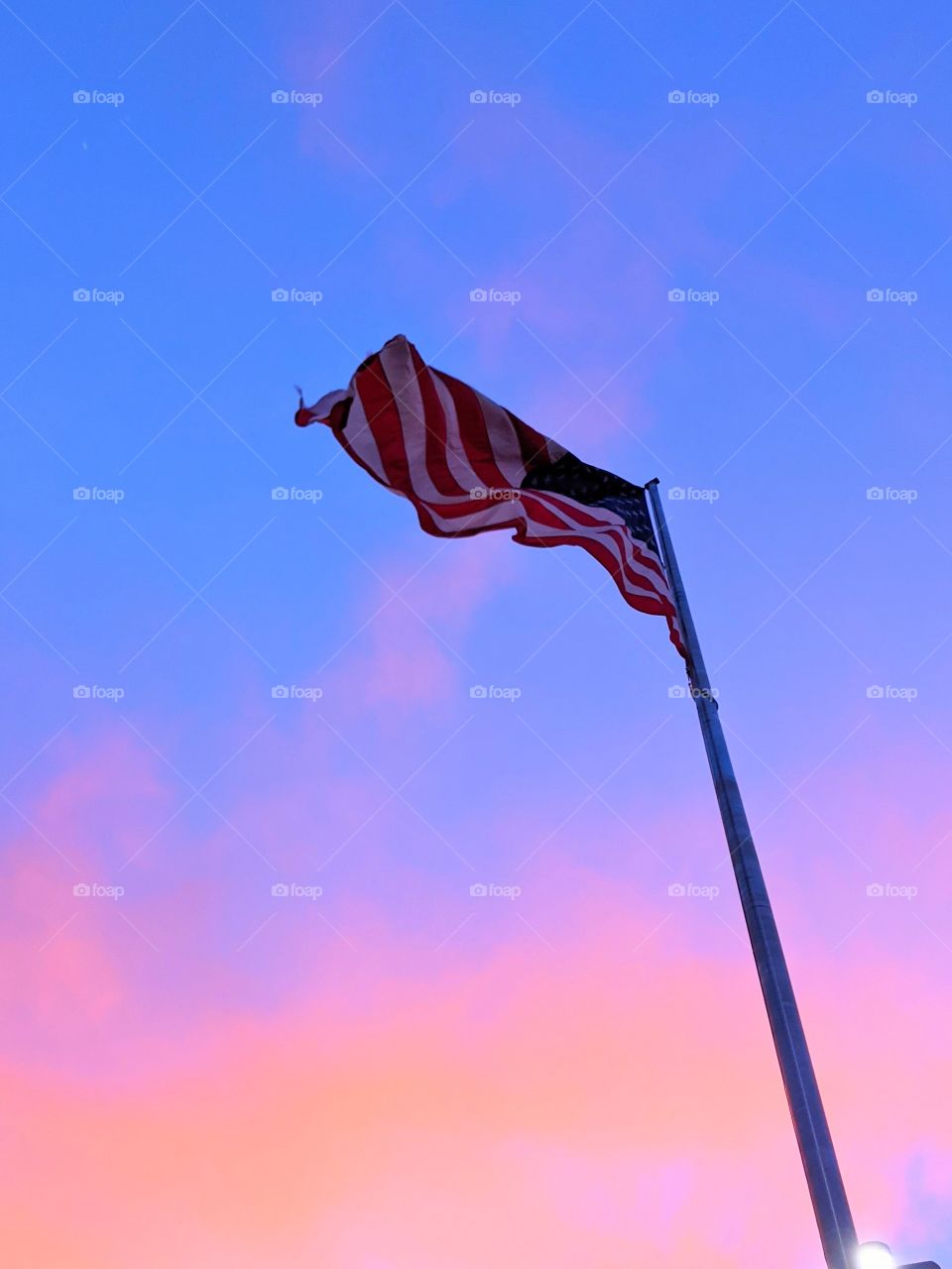 American flag at sunset.