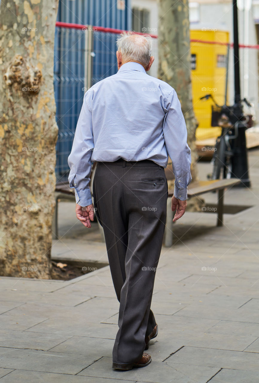 Elderly man walking