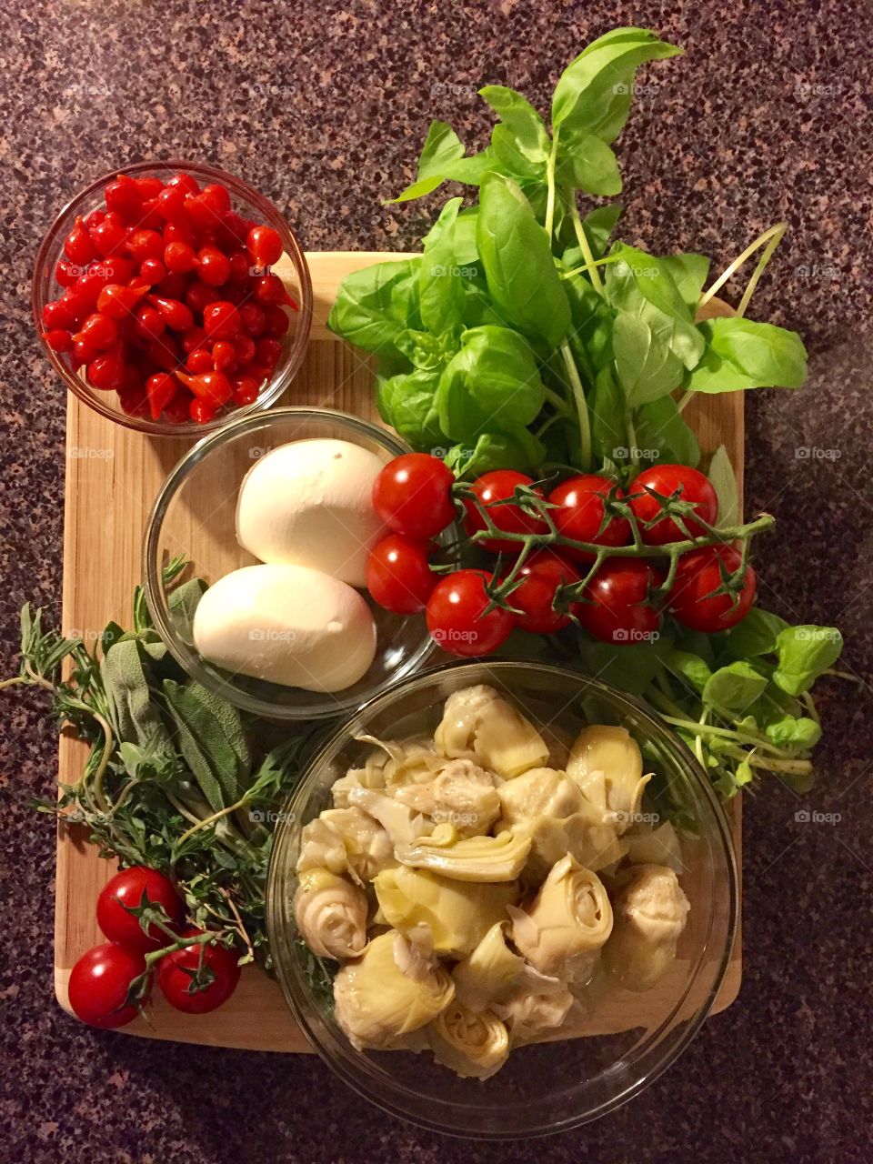 Peruvian sweet peppers, cherry tomatoes, basil, herbs, artichokes and mozzerella