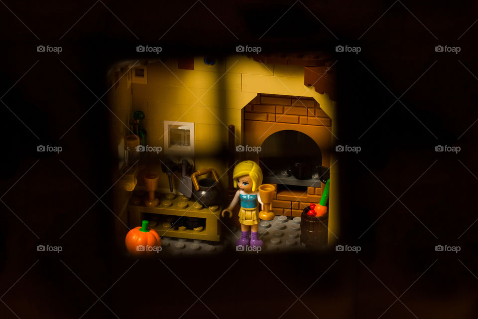Window view - cooking in the Lego kitchen with fire place, girl, pumpkin and pots