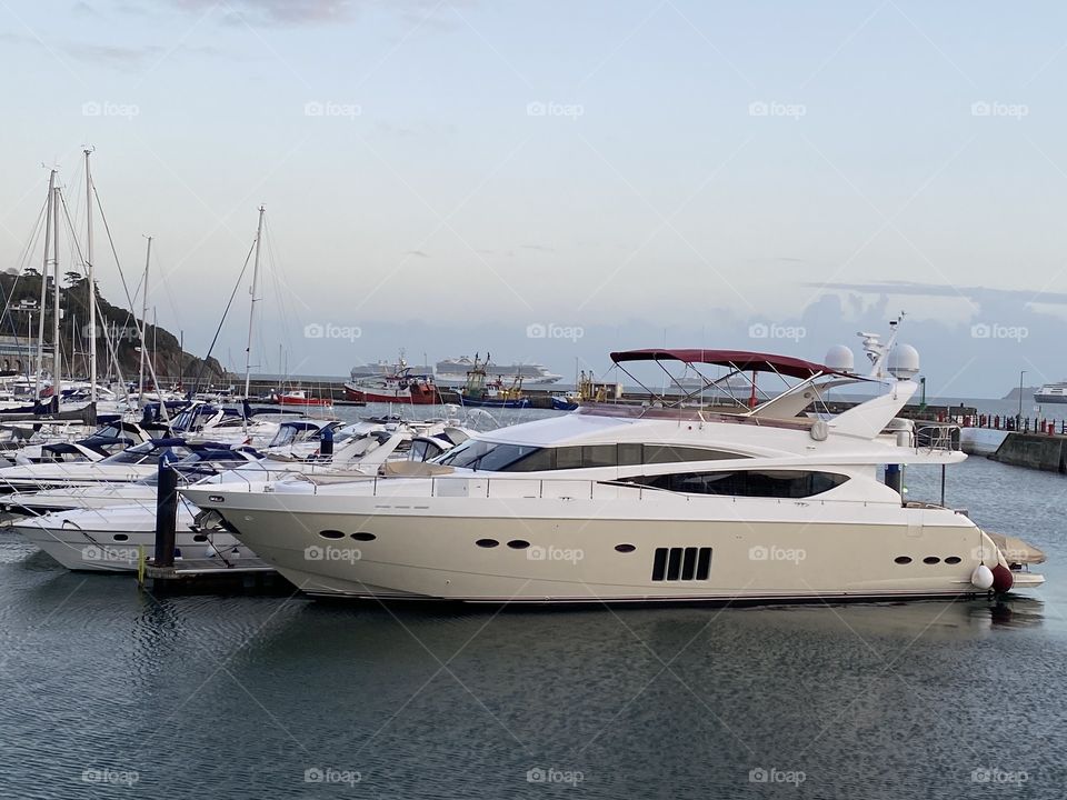 Luxury yachts that are more common now in Torbay, UK