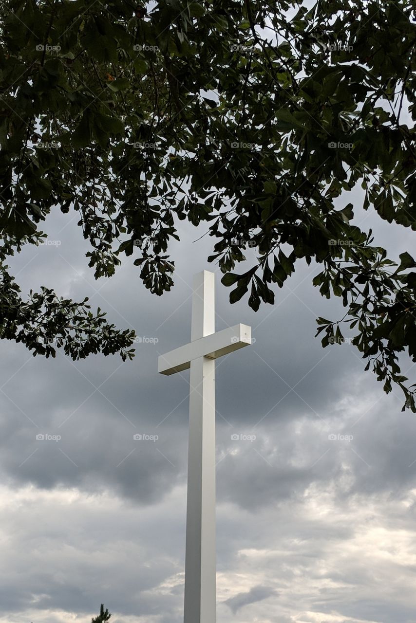 cross on cloudy day
