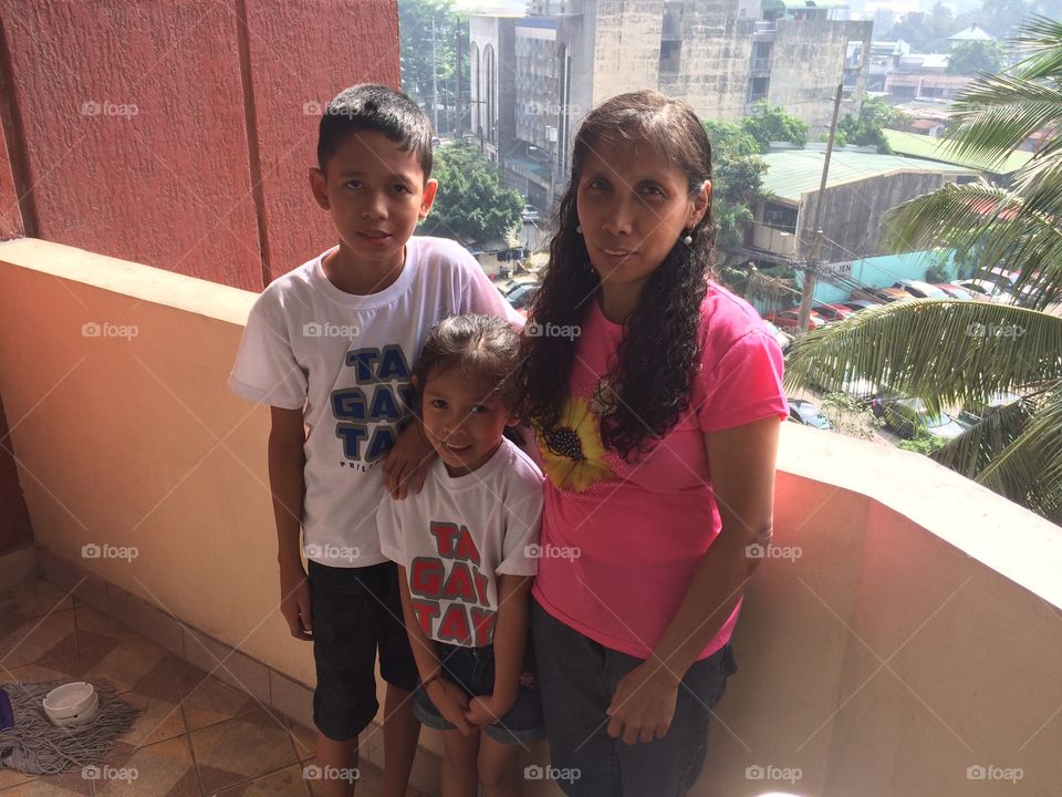 My son and daughter in Manila, Philippines on holiday, also there their Auntie.