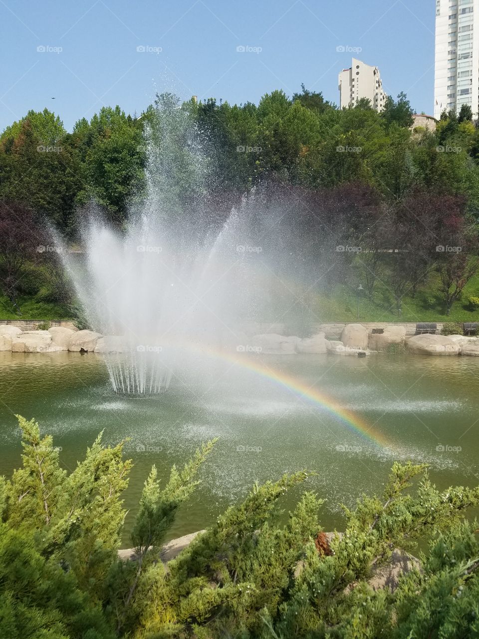 a waterfountain in the dikman vadesi park in Ankara Turkey,  rainbow